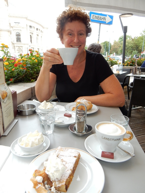 Laura envoys coffe with Apfelstrudel mit shlag (heavy cream) at Cafe Landtmann, Vienna