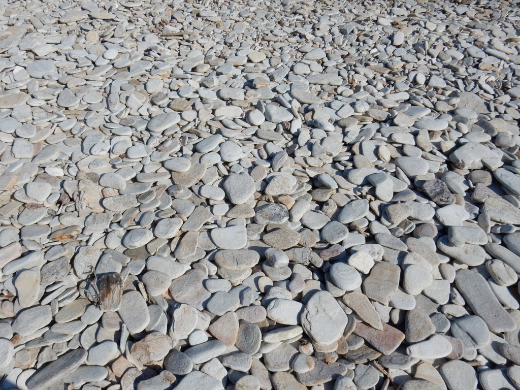 Flat stones make up the beach at St. Georges, Antiparos