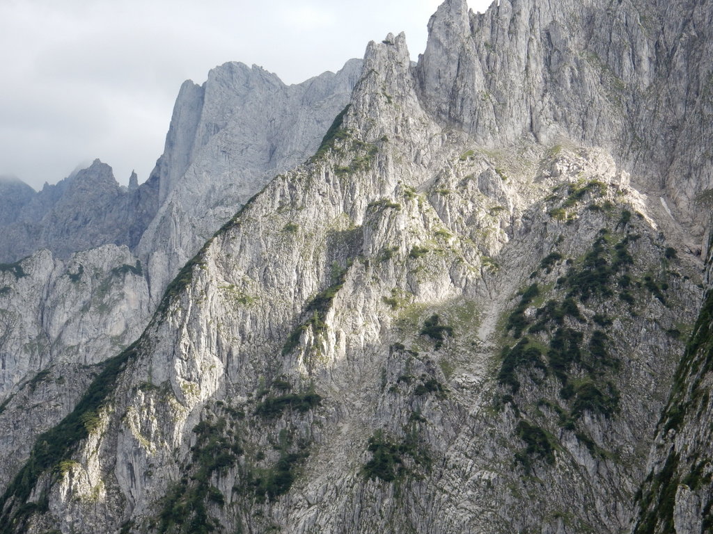 Dachstein Mountains rise steeply over Gosau Lake, Austria