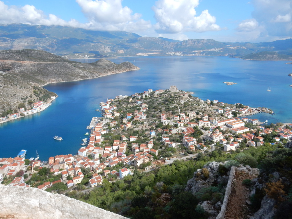 View of Kastellorizo harbor from the top of the cliffs. Sabbatical III can be seen in nearby Mandraki Bay on the left.