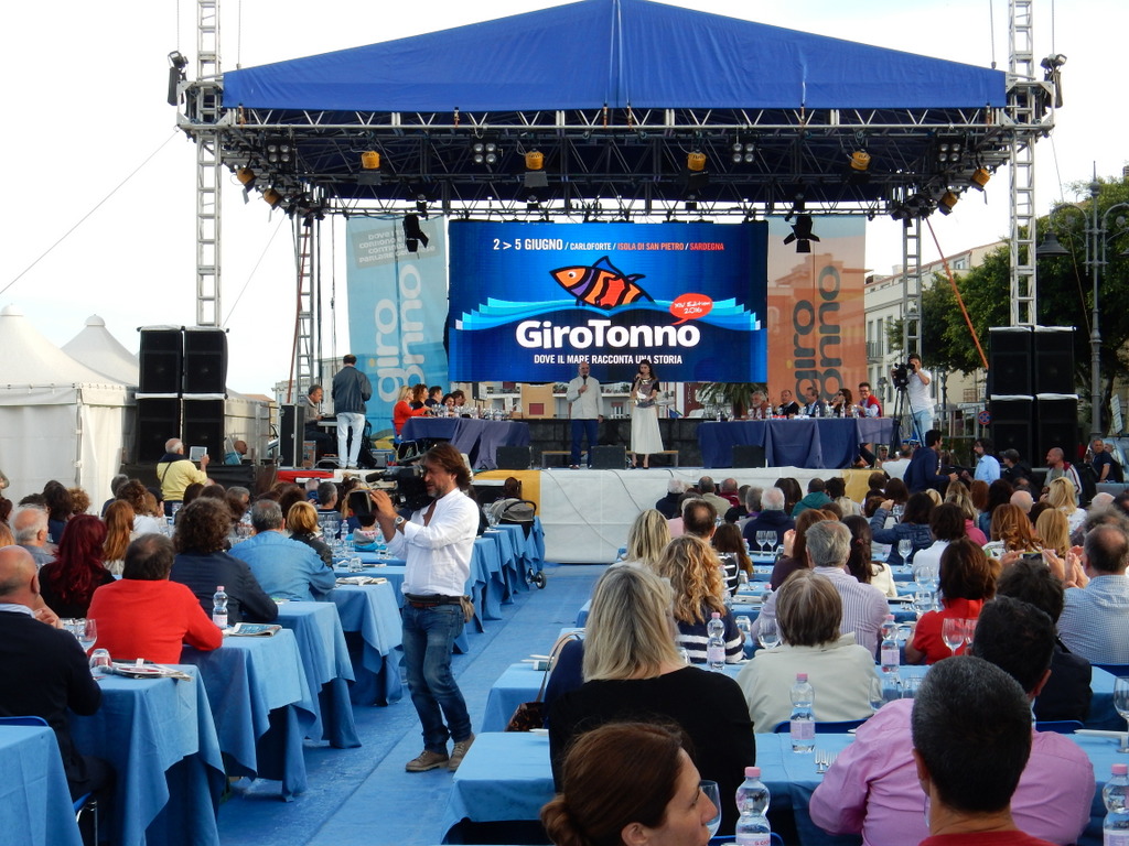 Judging tuna dishes prepared by an set of international chefs at the Giro Tonna, Carloforte