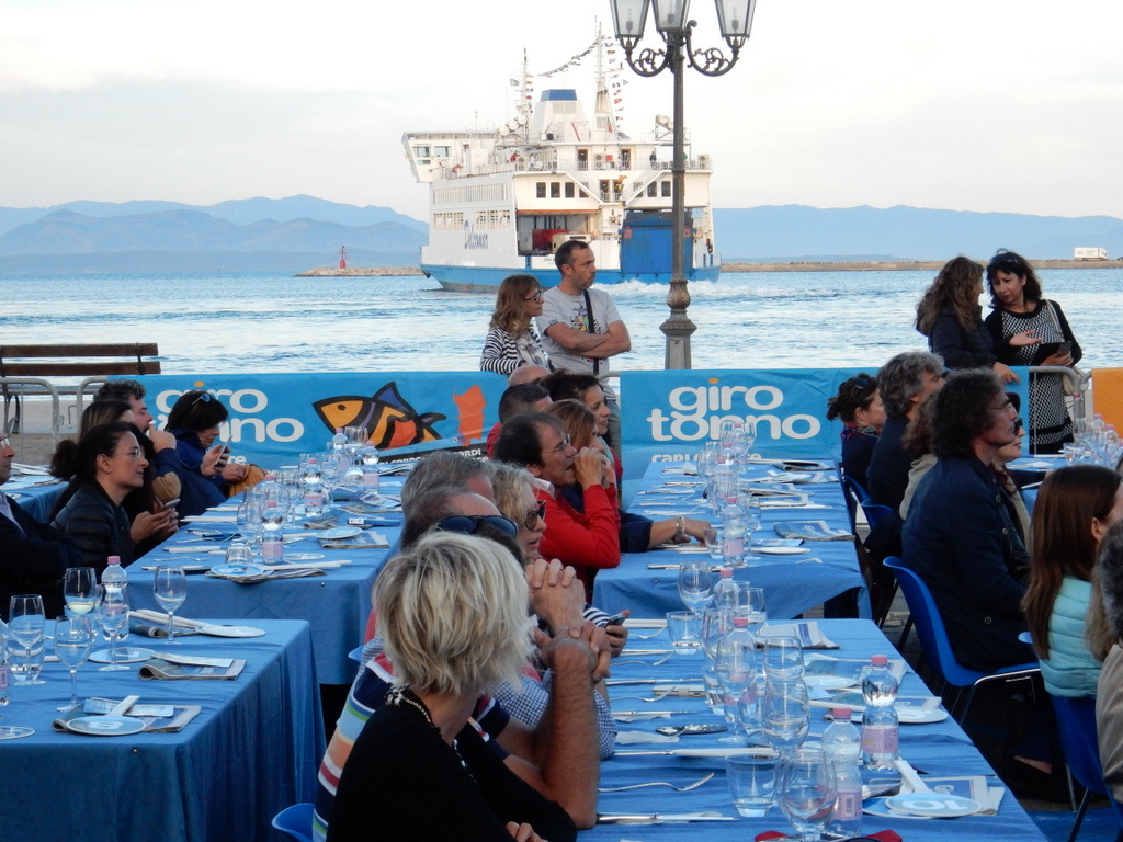 Judging tuna dishes prepared by an set of international chefs at the Giro Tonna, Carloforte