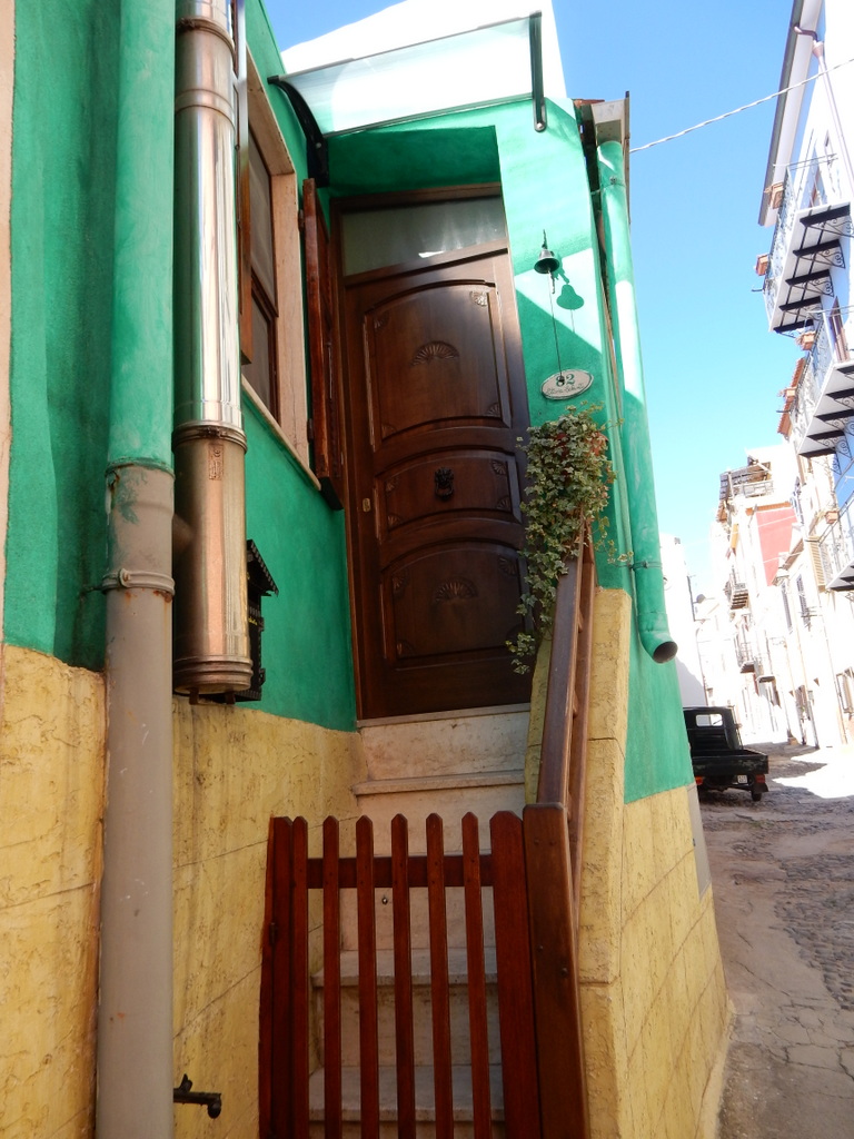 Decorated entrance to a house in Bosa